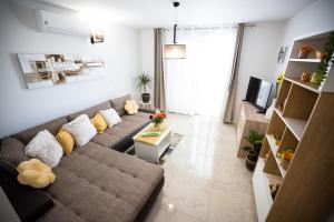 TV a/nebo společenská místnost v ubytování Apartmani Lelu