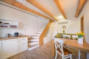 Kuchyň nebo kuchyňský kout v ubytování Hotel Bílý jednorožec