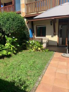 Zahrada ubytování Apartamento en el Paseo de Manuel Noriega, Nº 9, con jardín privado, Wifi, en Comillas