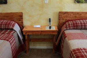 Postel nebo postele na pokoji v ubytování Hurricane Hideaway Lodging
