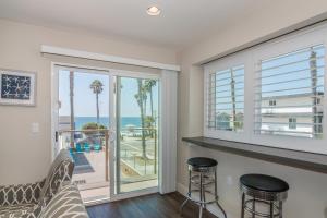 a living room with a view of the ocean at 1202 South Pacific in Oceanside