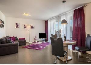 Телевизор и/или развлекательный центр в Iluna