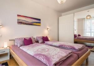 Кровать или кровати в номере Iluna