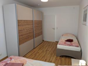Postel nebo postele na pokoji v ubytování Ferienwohnung MonSevi