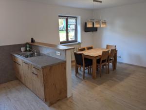 Kuchyň nebo kuchyňský kout v ubytování Ferienwohnung MonSevi