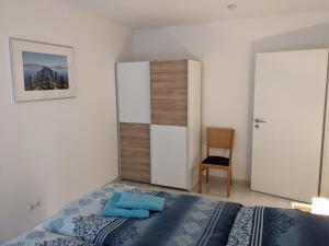 Postel nebo postele na pokoji v ubytování Ferienwohnung MonSevi