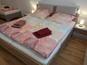 Postel nebo postele na pokoji v ubytování Ferienwohnung MonSevi