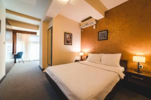 Postel nebo postele na pokoji v ubytování Hotel Keto