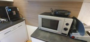 Kuchyňa alebo kuchynka v ubytovaní Mely Apartment