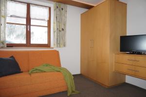מיטה או מיטות בחדר ב-Haus Schwendinger