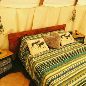 Postel nebo postele na pokoji v ubytování Casa Bella Teepees
