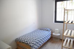 Posteľ alebo postele v izbe v ubytovaní VACARE - Apartamento 3 habitaciones, Capricho en el centro de Santander! + 5 fotografií