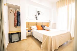 Rúm í herbergi á Volver B&B