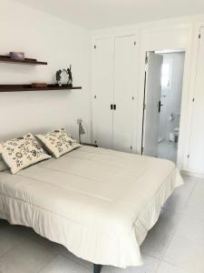 Кровать или кровати в номере Beach Apartment Minerva