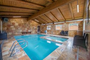 a large pool in a large room with at Cowboy Village Resort in Jackson