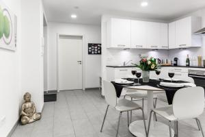 Η κουζίνα ή μικρή κουζίνα στο Auszeit Apartment WESTEND