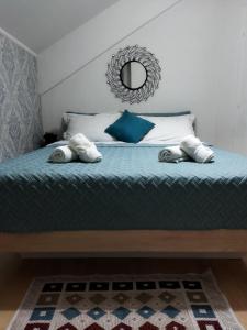 Giường trong phòng chung tại Apartment Stasha with free access to gym