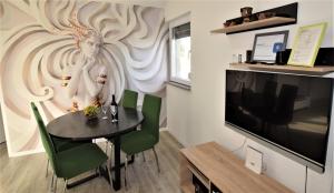 TV/Unterhaltungsangebot in der Unterkunft Novalja Penthouse Apartment