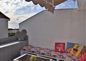 Ein Sitzbereich in der Unterkunft Novalja Penthouse Apartment