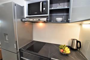 Küche/Küchenzeile in der Unterkunft Novalja Penthouse Apartment