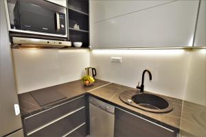 Küche/Küchenzeile in der Unterkunft Novalja Penthouse Apartment