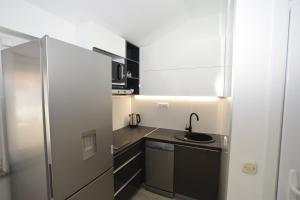 Küche/Küchenzeile in der Unterkunft Novalja Penthouse Apartment