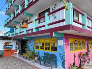 a building that is painted like a house at Hotel San Felipe de Jesus Yucatan in San Felipe