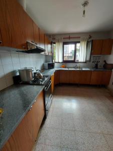 Kuchyň nebo kuchyňský kout v ubytování COYA HOSTEL