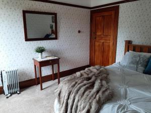 Postel nebo postele na pokoji v ubytování Wainono Homestead