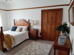Postel nebo postele na pokoji v ubytování Wainono Homestead