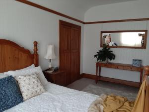 Postel nebo postele na pokoji v ubytování Wainono Homestead