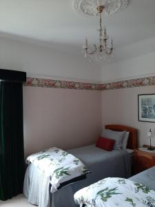 Postel nebo postele na pokoji v ubytování Wainono Homestead