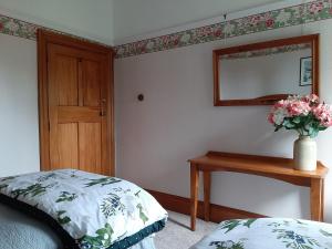 Postel nebo postele na pokoji v ubytování Wainono Homestead