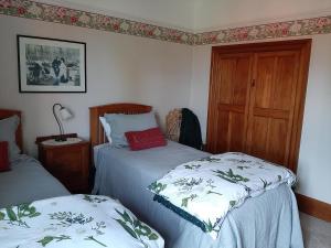 Postel nebo postele na pokoji v ubytování Wainono Homestead