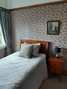 Postel nebo postele na pokoji v ubytování Wainono Homestead