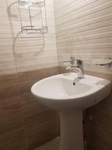 Koupelna v ubytování Guest House Sando