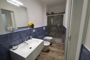Koupelna v ubytování Sogni di Sabbia
