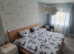 Posteľ alebo postele v izbe v ubytovaní Giżycko - Wilkasy - ApartMazury