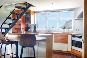 A kitchen or kitchenette at Villa Elihrisos