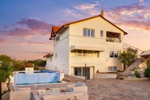 The swimming pool at or close to Villa Elihrisos