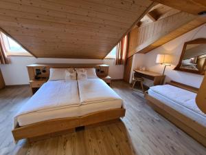 Postel nebo postele na pokoji v ubytování Hotel Piedibosco