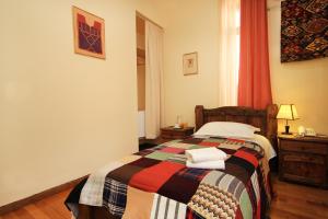 Voodi või voodid majutusasutuse Silk Road Hotel toas
