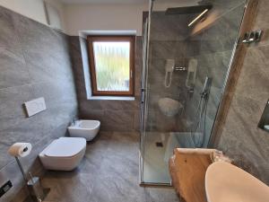Koupelna v ubytování Hotel Piedibosco