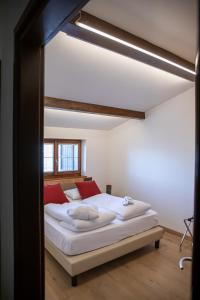 מיטה או מיטות בחדר ב-Maison Faganello Chalet