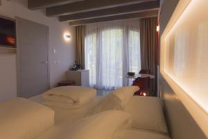 Agriturismo Redó客房内的一张或多张床位