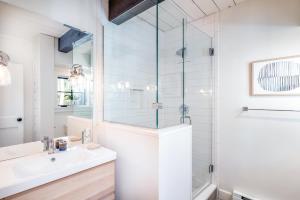 a bathroom with a sink and a glass shower at Deer Park - Ski Ranches in Telluride +14 photos