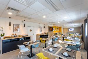 Restaurant o iba pang lugar na makakainan sa Nemea Appart Hotel Europe Velizy Villacoublay