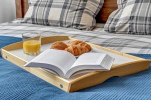 Łóżko lub łóżka w pokoju w obiekcie Blue Mandarin Apartments III Haffnera