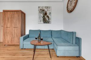 Część wypoczynkowa w obiekcie Blue Mandarin Apartments III Haffnera