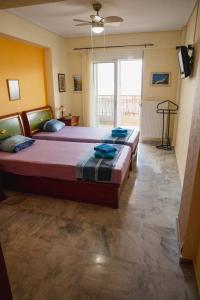 Postel nebo postele na pokoji v ubytování Sunray luxury apartment Volos